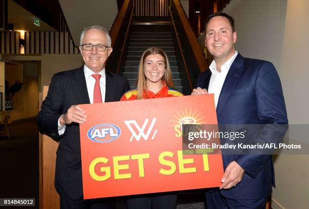 Prime Minister Malcolm Turnbull poses for a photo while taking a tour of the newly built facilities at the opening of the Suns Training and...