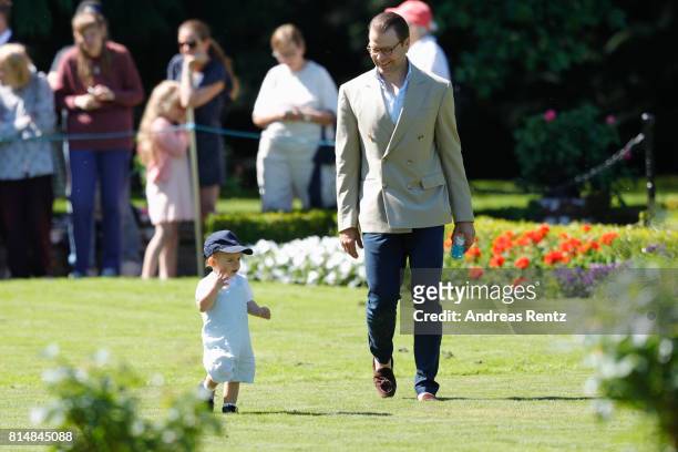 Prince Oscar of Sweden and Prince Daniel of Sweden are seen meeting the people gathered in front of Solliden Palace to celebrate the 40th birthday of...