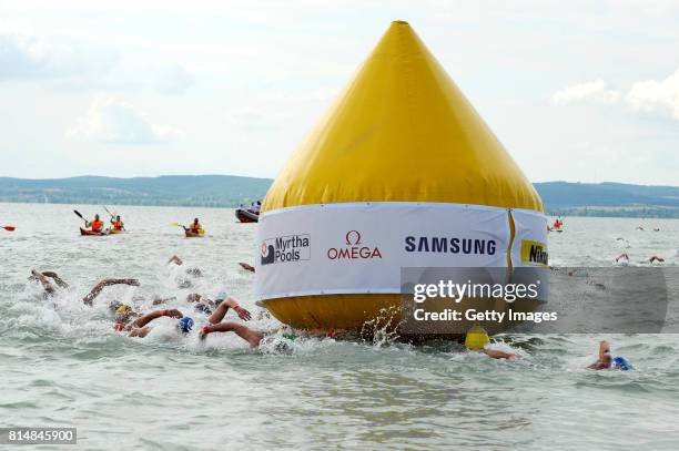 Marc-Antoine Olivier of France leads the field during the Men's 5km Open Water Swimming on day two of the Budapest 2017 FINA World Championships on...