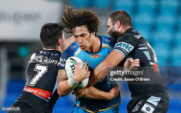 Kevin Proctor of the Titans in action during the round 19 NRL match between the Gold Coast Titans and the Cronulla Sharks at Cbus Super Stadium on...