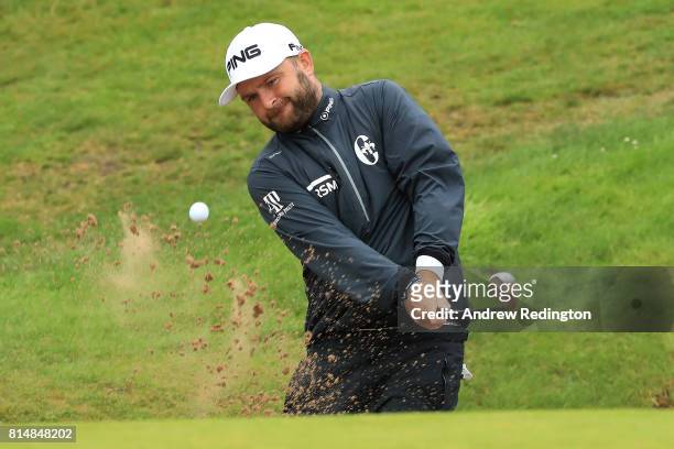 Andy Sullivan of England hits his third shot on the 18th hole which he holed for an eagle during day three of the AAM Scottish Open at Dundonald...