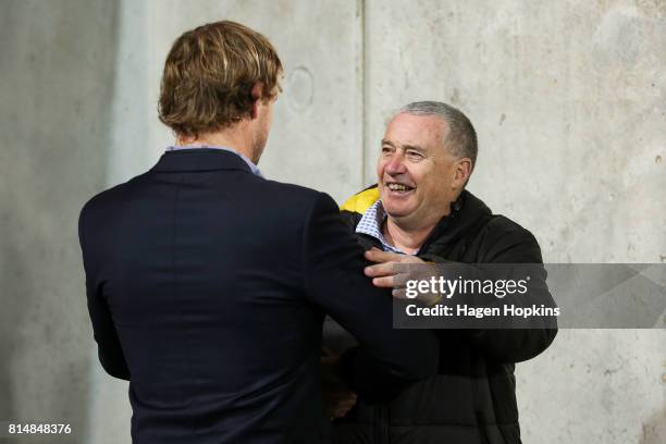 Coach Chris Boyd of the Hurricanes and coach Scott Robertson of the Crusaders wish each other well prior to the round 17 Super Rugby match between...