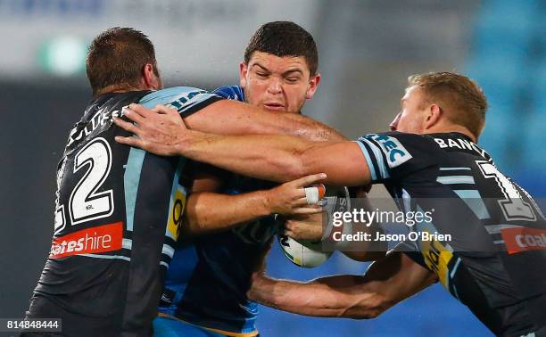 Ashley Taylor of the Titans in action during the round 19 NRL match between the Gold Coast Titans and the Cronulla Sharks at Cbus Super Stadium on...