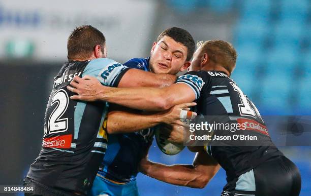 Ashley Taylor of the Titans in action during the round 19 NRL match between the Gold Coast Titans and the Cronulla Sharks at Cbus Super Stadium on...