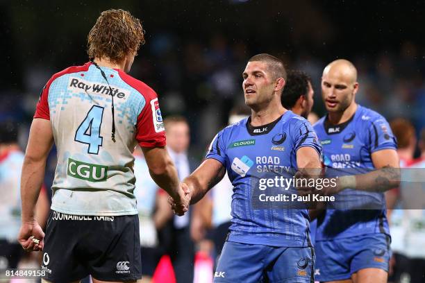 Ned Hanigan of the Waratahs and Matt Hodgson of the Force shake hands after the round 17 Super Rugby match between the Force and the Waratahs at nib...