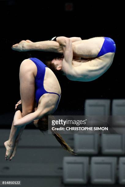 Great Britain's Lois Toulson and Great Britain's Matthew Lee compete in the Mixed 10m Synchro Platform final during the diving competition at the...