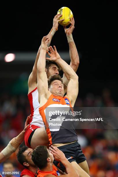 Sam Naismith of the Swans marks over Toby Greene of the Giants during the round 17 AFL match between the Greater Western Sydney Giants and the Sydney...
