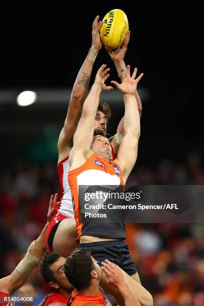 Sam Naismith of the Swans marks over Toby Greene of the Giants during the round 17 AFL match between the Greater Western Sydney Giants and the Sydney...