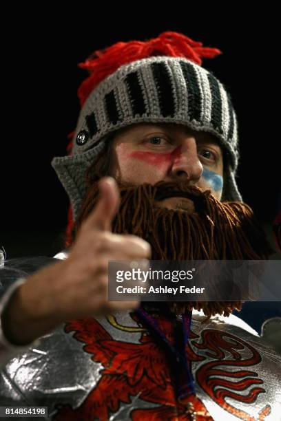 Knights fan shows their support during the round 19 NRL match between the Newcastle Knights and the Brisbane Broncos at McDonald Jones Stadium on...