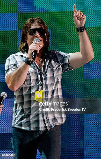 Billy Ray Cyrus addresses the crowd at the VAULT Concert Stages during the 2008 CMA Music Festival on June 6, 2008 at LP Field in Nashville,...