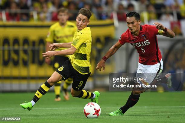 Emre Mor of Borussia Dortmund runs with the ball during the preseason friendly match between Urawa Red Diamonds and Borussia Dortmund at Saitama...