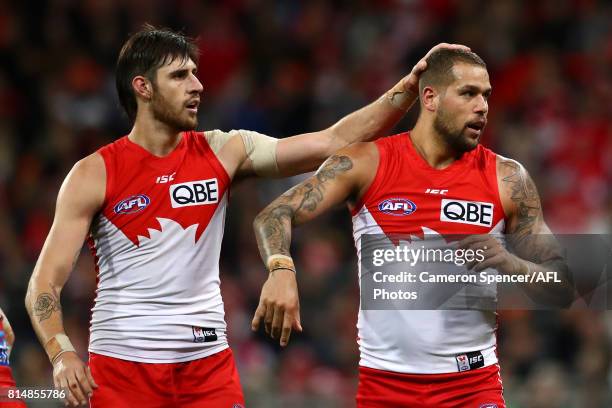 Sam Naismith of the Swans congratulates team mate Lance Franklin of the Swans after kicking a goal during the round 17 AFL match between the Greater...