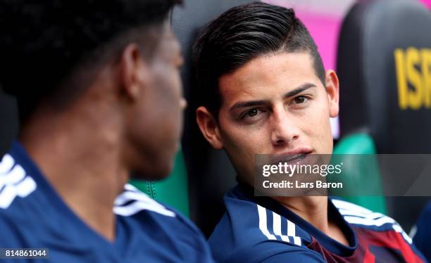 James Rodriguez of Muenchen is seen on the bench during the Telekom Cup 2017 match between Bayern Muenchen and 1899 Hoffenheim at on July 15, 2017 in...