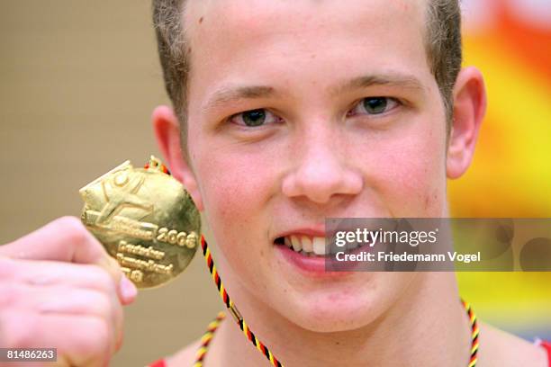 Fabian Hambuechen of Germany celebrates after winning the men inividual all rounder competition of the German Artistic Gymnastics Championships at...