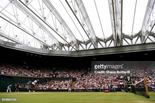 General view as Venus Williams of The United States serves under the closed centre court roof during the Ladies Singles final against Garbine...