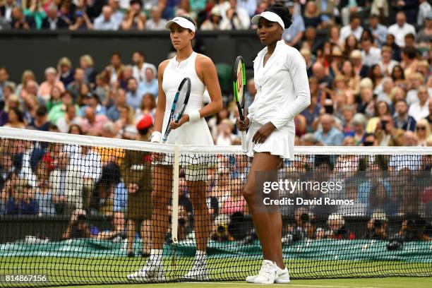 Venus Williams of The United States and Garbine Muguruza of Spain pose prior to the Ladies Singles final on day twelve of the Wimbledon Lawn Tennis...