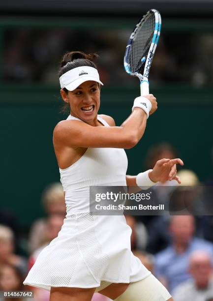 Garbine Muguruza of Spain plays a forehand during the Ladies Singles final against Venus Williams of The United States on day twelve of the Wimbledon...