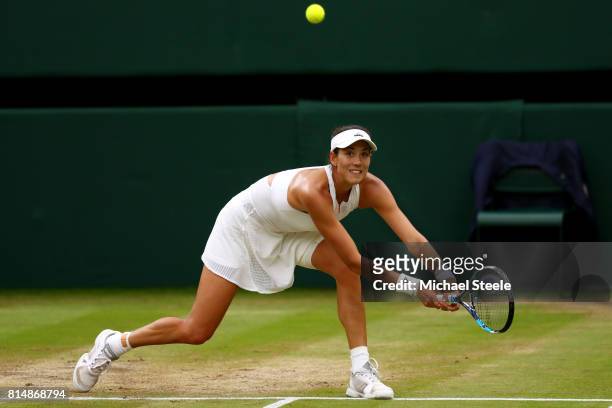 Garbine Muguruza of Spain plays a backhand during the Ladies Singles final against Venus Williams of The United States on day twelve of the Wimbledon...