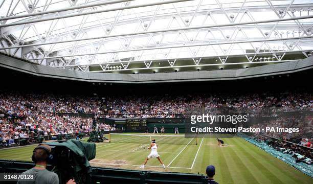 General view of centre court and Venus Williams against Garbine Muguruza in the Ladie's Singles final on day twelve of the Wimbledon Championships at...