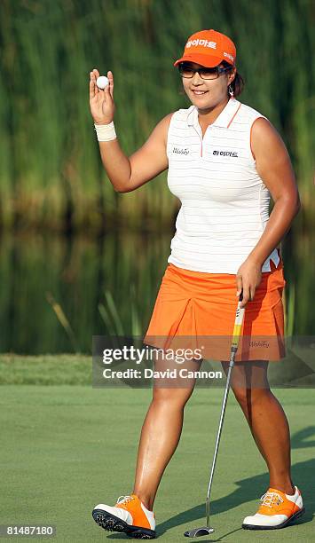 Jee Young Lee of South Korea holes her birdie putt at the 18th hole during the third round of the 2008 McDonald's LPGA Championship held at Bulle...