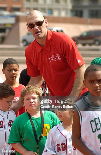 Scot Pollard of the Boston Celtics readies his team for a relay competition during an appearance at the NBA Nation Tour stop at Boston City Hall...