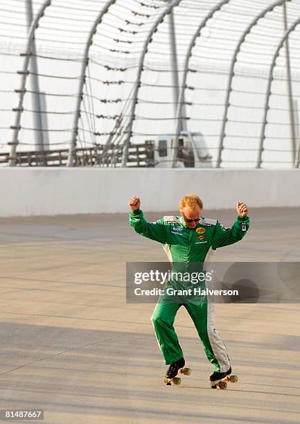 Morgan Shepherd, driver of the Victory in Jesus Racing Dodge, roller skates down the front stretch before the start of the NASCAR Nationwide Series...