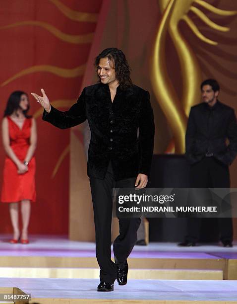 Indian Bollywood actor Vivek Oberoi walks the ramp at a fashion show on the second day of the International Indian Film Academy Awards 2008 weekend...