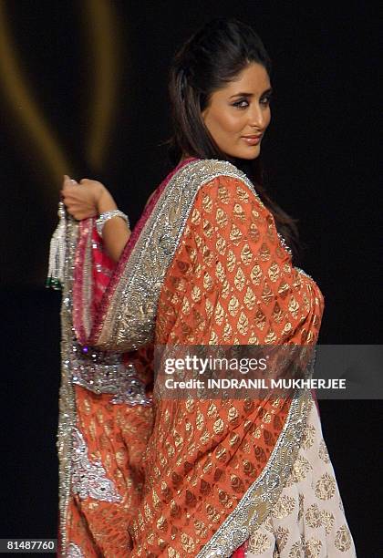 Indian Bollywood actor Kareena Kapoor walks the ramp at a fashion show on the second day of the International Indian Film Academy Awards 2008 weekend...