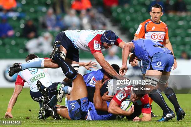 Dean Mumm of the Waratahs looks to assist Michael Hooper after being tackled during the round 17 Super Rugby match between the Force and the Waratahs...