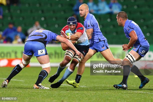 Dean Mumm of the Waratahs looks to avoid being tackled during the round 17 Super Rugby match between the Force and the Waratahs at nib Stadium on...