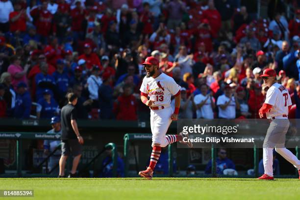 Matt Carpenter of the St. Louis Cardinals celebrates after hitting a walk-off home run against the Toronto Blue Jays at Busch Stadium on April 27,...