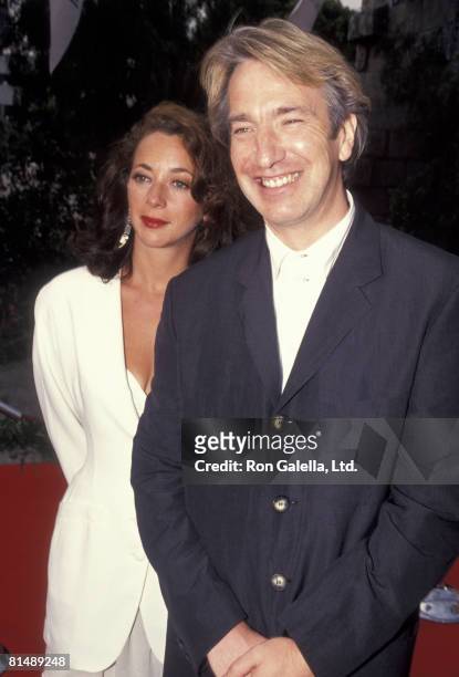 Actor Alan Rickman and date attending the premiere of "Robin Hood - Prince of Thieves" on June 10, 1991 at Mann Village Theater in Westwood,...