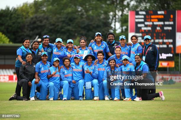 Members of the India squad pose for a photograph during the ICC Women's World Cup match between India and New Zealand at The 3aaa County Ground on...