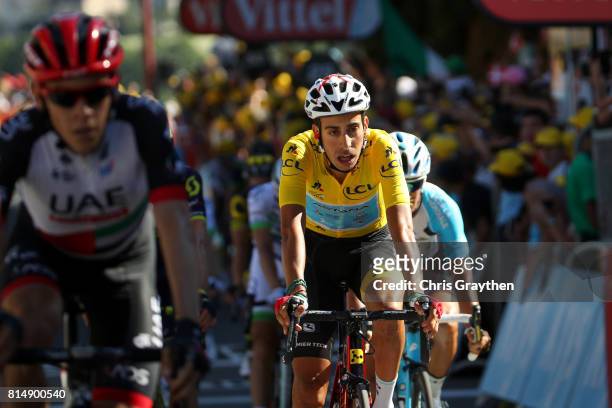 Fabio Aru of Italy riding for Astana Pro Team in the leader's jersey crosses the finish line during stage 14 of the 2017 Le Tour de France, a 181.5km...