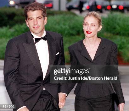 John F. Kennedy, Jr. and his wife Carolyn Bessette Kennedy arrive at