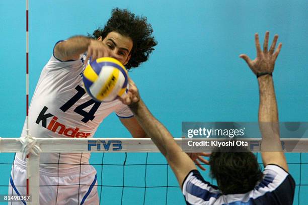 Alessandro Fei of Italy spikes against Argentina during the FIVB Men's World Olympic Qualification Tournament match between Argentina and Italy at...