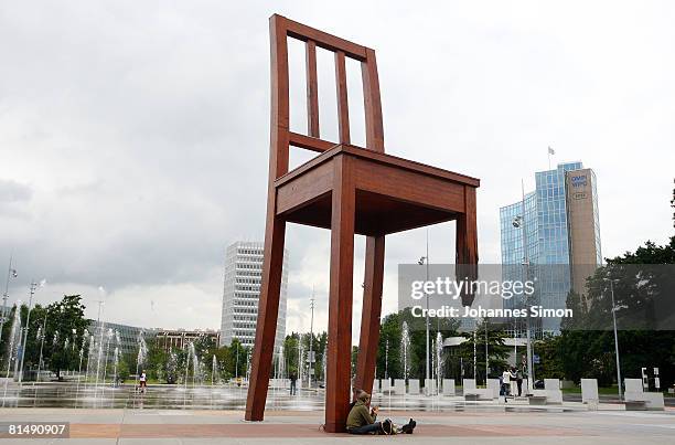 The sculputure 'Broken Chair' by Daniel Berset is seen in front of the United Nations Office on June 8, 2008 in Geneva, Switzerland. The art work was...