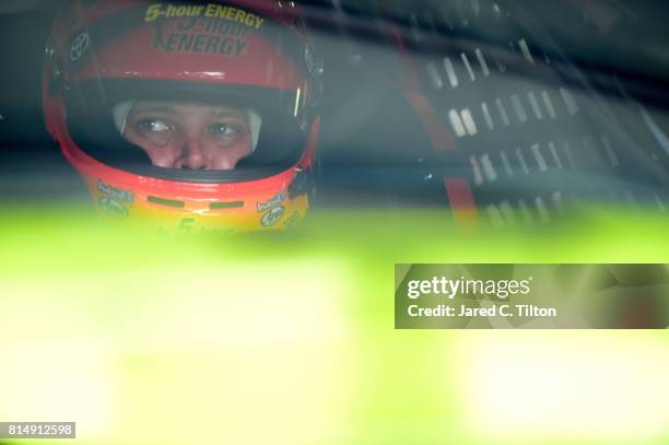 Erik Jones, driver of the 5-hour ENERGY Extra Strength Toyota, sits in his car during practice for the Monster Energy NASCAR Cup Series Overton's 301...