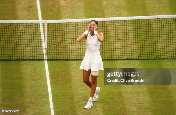 Garbine Muguruza of Spain celebrates victory after the Ladies Singles final against Venus Williams of The United States on day twelve of the...