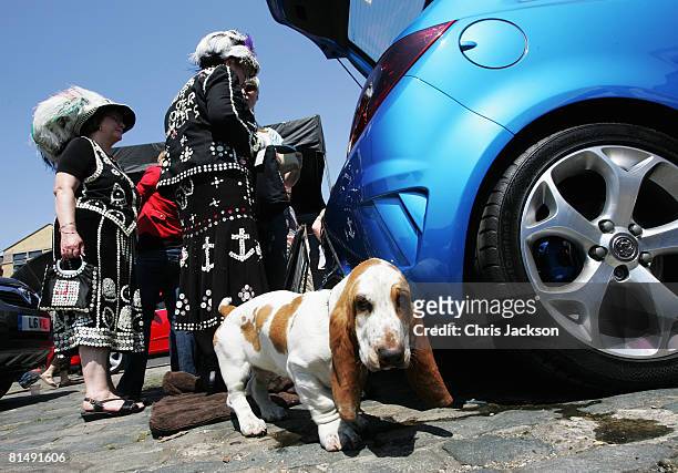 Pearly Kings and Queens are seen next to their car boot during the Vauxhall Art Car Boot fair in the Old Truman Brewery on June 8, 2008 in London,...