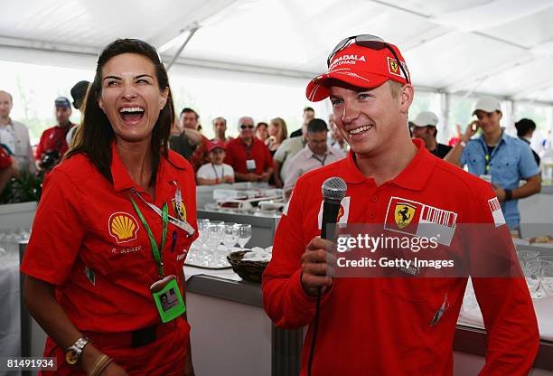 Kimi Raikkonen of Finland and Ferrari answers questions from Regula Bleuler of Shell at a Shell guests luncheon before the Canadian Formula One Grand...