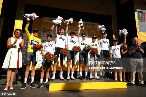 Team Sky pose for a photo on the podium for leading the team classification during stage 14 of the 2017 Le Tour de France, a 181.5km stage from...