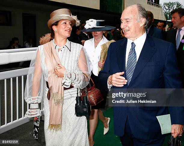 Aga Khan and his daughter Princess Zahra walk together after Le Prix de Diane ceremony on June 08, 2008 in Chantilly, France.