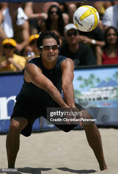 Kevin Wong passes the ball in the AVP Hermosa Beach Open quarterfinal match on June 8, 2008 at the Pier in Hermosa Beach, California. Matt Olson and...