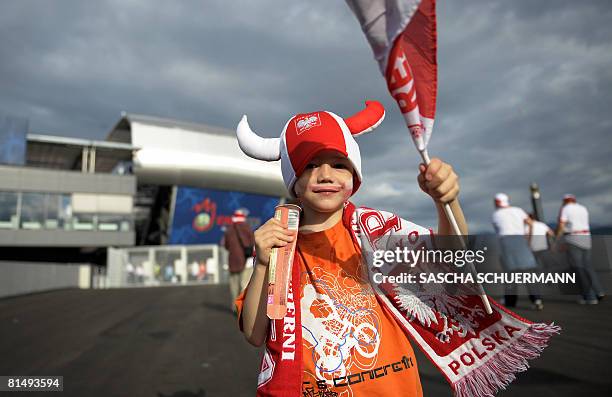 Young fan of the Polish team poses as he arrives a few hours before the Euro 2008 Championships Group B football match Germany vs. Poland on June 8,...