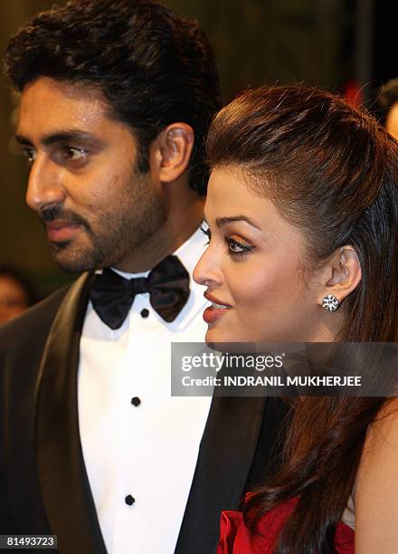 Indian actor Abhishek Bachchan and his actor-wife Aishwarya Rai-Bachchan speak to the media on arriving at the International Indian Film Academy...