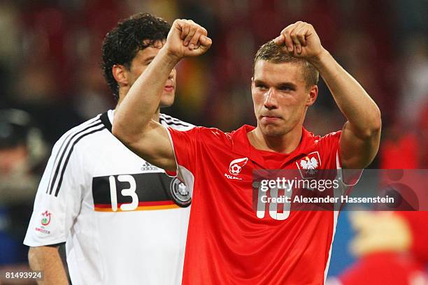 Lukas Podolski of Germany celebrates wearing a Polish shirt after the UEFA EURO 2008 Group B match between Germany and Poland at Worthersee Stadion...