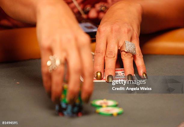 Actress Jennifer Tilly participates in the Ladies No-Limit Hold 'em poker tournament at the World Series of Poker at the Rio Hotel & Casino on June...