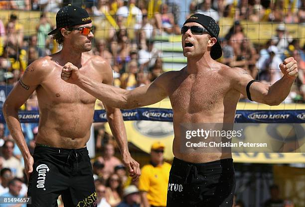 Casey Jennings and Matt Fuerbringer celebrate a point during the AVP Hermosa Beach Open final on June 8, 2008 at the Pier in Hermosa Beach,...