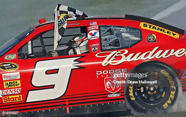 Kasey Kahne, driver of the Budweiser Dodge celebrates after winning the NASCAR Sprint Cup Series Pocono 500 on June 8, 2008 at Pocono International...